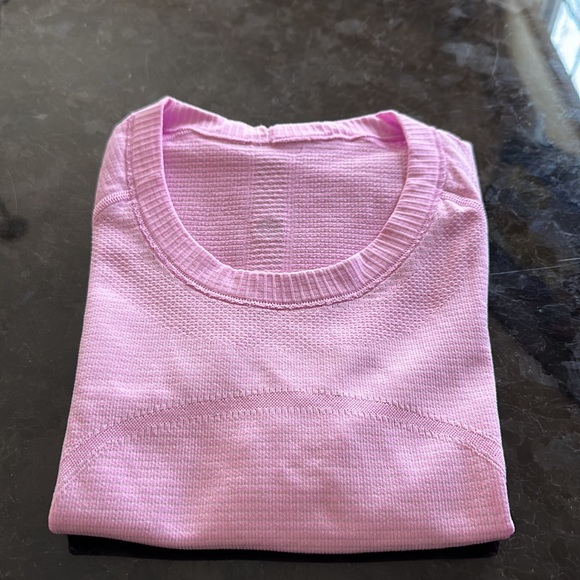 Lululemon, short sleeve top , pink color , size 8 , good condition - Picture 2 of 2